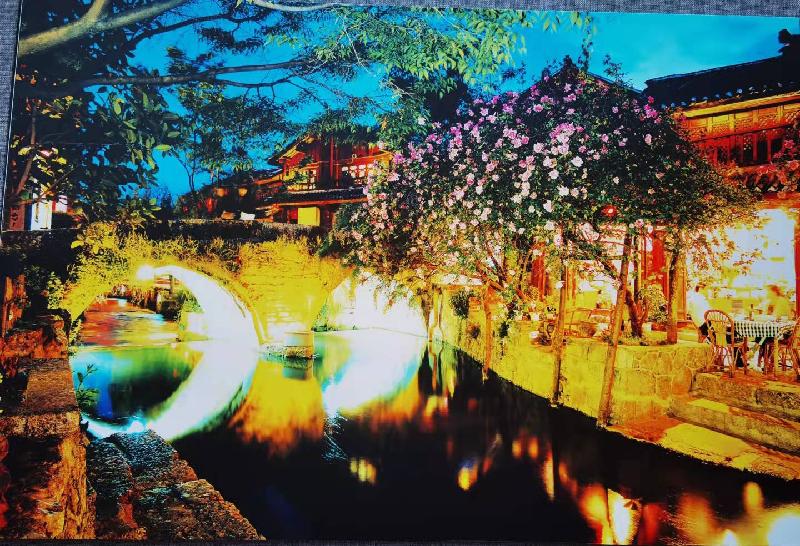李红芬老师倾情演绎自创作品：记忆中的古城——观唐新华丽江古城摄影展｜海外头条（图4）