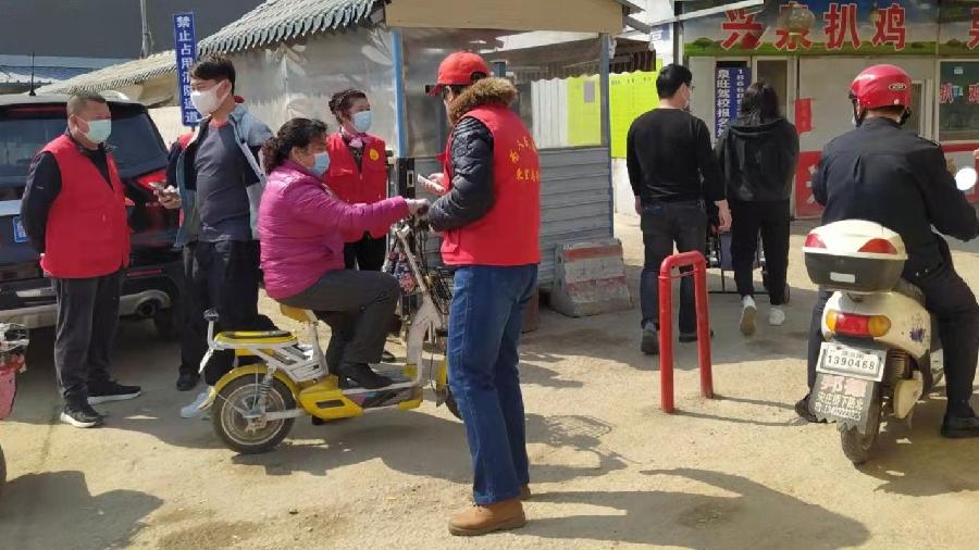 防疫增添志愿红 团结一心战疫情