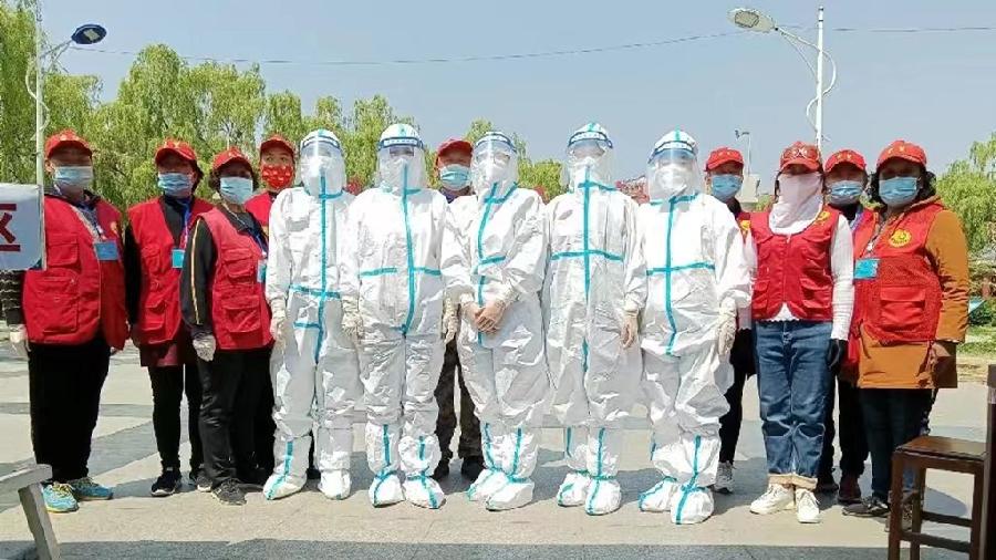 疫情侵扰紧急核检 志愿助力获民称赞