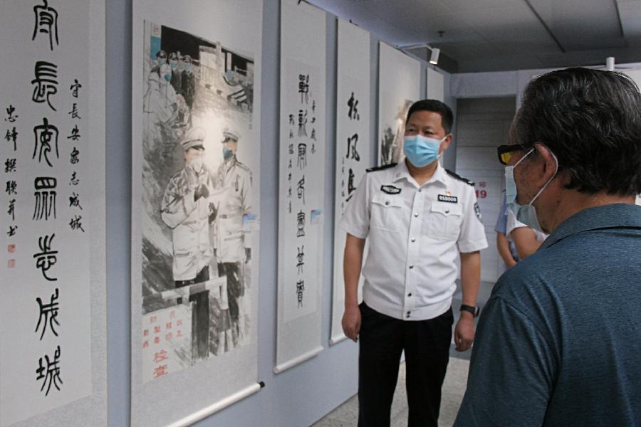 西安市公安局交通警察支队隆重举行“喜迎二十大 忠诚保平安”首届警营文化艺术节书画摄影展揭幕仪式（图5）