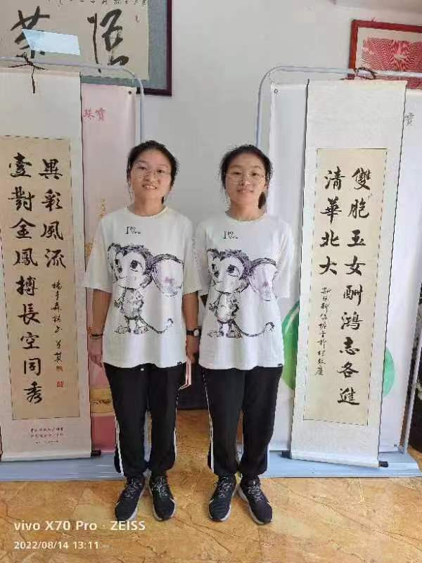 孪生姐妹创奇迹同圆清华北大梦