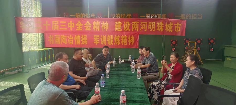 书画陶冶情操，军训锻炼性格——聊城市书画研究会赴烈焰蓝盾少年军事训练营开展书画交流