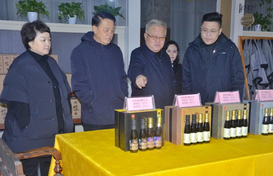 聊城大学党委原副书记徐传光、中国平安保险聊城支公司总经理王东一行到山东正信味业食品有限公司参观交流（图6）