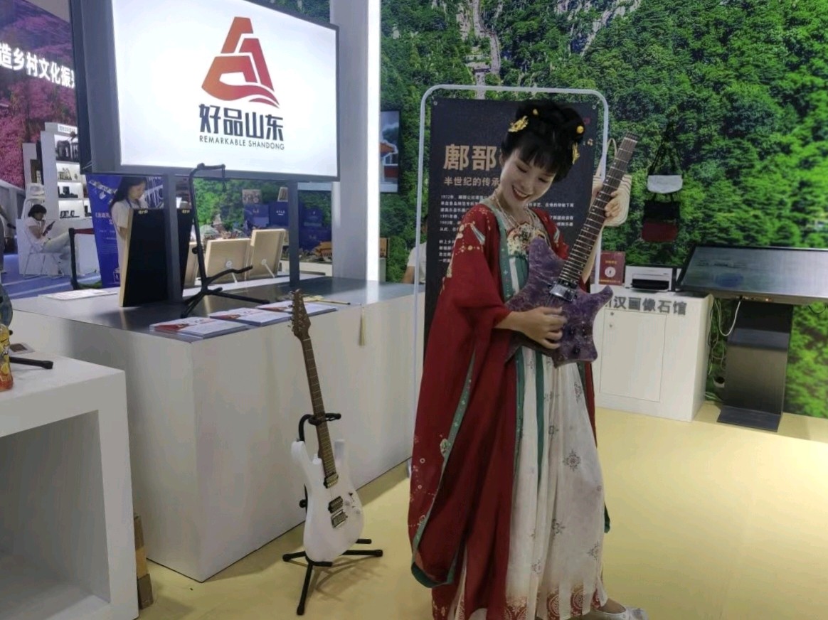 吉他邂逅文创鄌郚镇悦耳琴韵奏响深圳国际会展中心(潍坊昌乐)(图3)