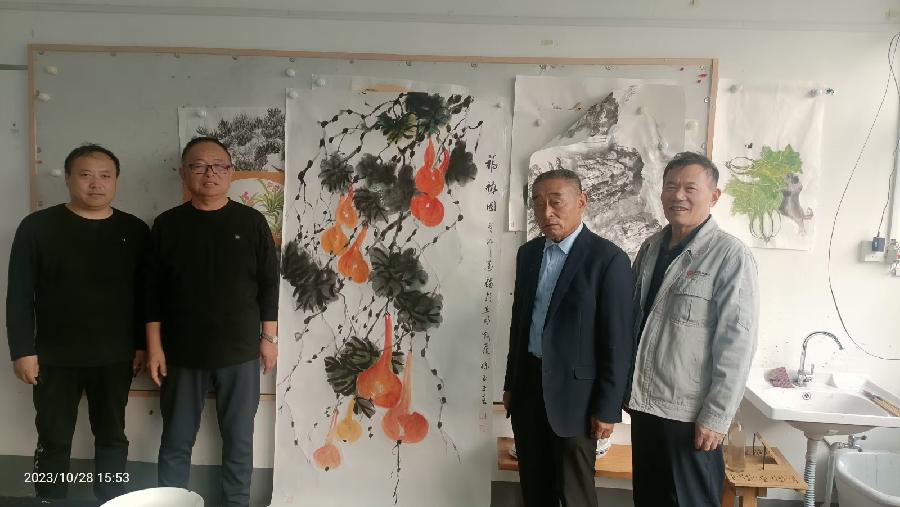 著名画家齐友昌和其得意门生徐玉正（图57）
