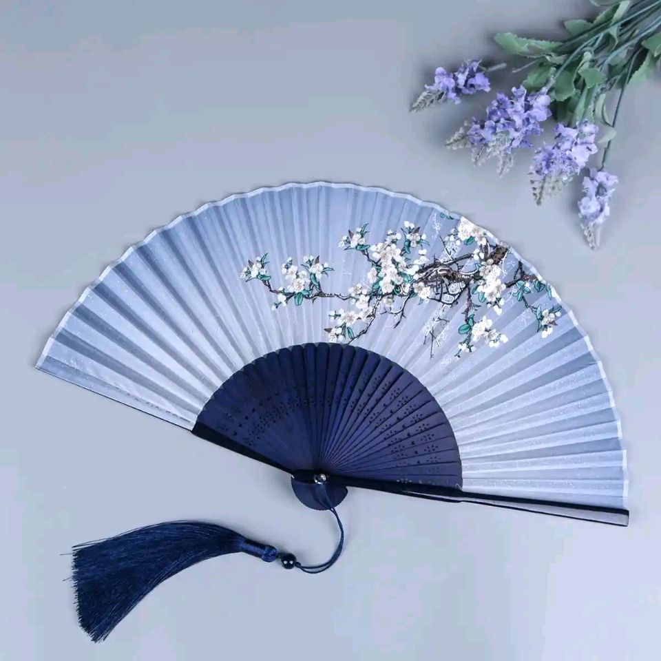 东方书剑的《七绝 咏扇》